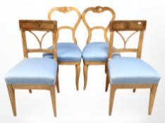 Two 19th-century continental burr walnut balloon-back chairs, and two further chairs.
