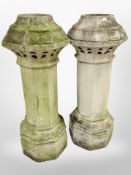 A pair of weathered concrete chimney tops, height 101cm.