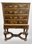 An 19th-century continental four-drawer chest on stand in a scumbled finish,
