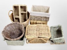 Approximately ten assorted wicker baskets.
