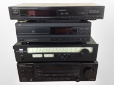 A Kenwood audio-video stereo receiver KR-V6060, A Sansui stereo tuner TU-217,