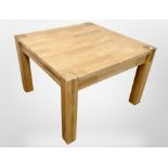 A contemporary oak square lamp table, 76cm wide x 52cm high.