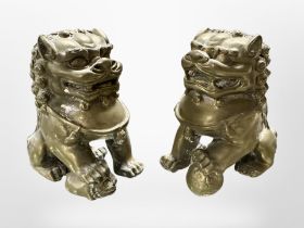 A pair of Chinese cast-bronze seated foo dogs, height 7cm.