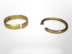 An 18ct gold band ring and a further 22ct gold band (both cut) CONDITION REPORT: