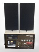 A Coomber multi-sound center, and a pair of Athena speakers, height 40cm.