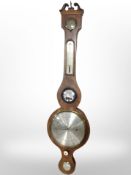 An inlaid mahogany banjo barometer with silvered dial.