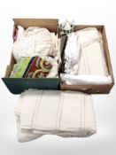 Two boxes containing curtains, linen, soft goods.