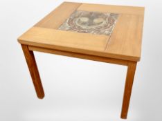 A Danish teak and tile-topped square lamp table, 68cm x 52cm high.