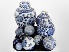A group of 20th century Chinese blue and white porcelain ginger jars and spheres