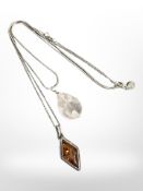 Rose quartz on silver chain, together with amber stone on silver chain.