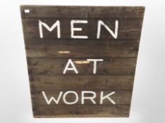 A painted pine 'Men At Work' sign, 77cm x 68cm.