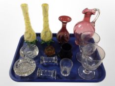 A group of antique glassware including pair of twist-stem candlesticks, crystal knife rests,