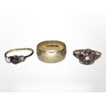 Two 9ct gold gem-set rings and a further band ring.