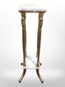 A gilt wood and marble jardiniere stand, height 105cm.