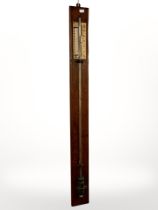 An oak stick barometer by Davis of Leeds, length 106cm.