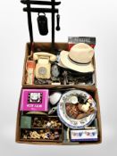Two boxes containing assorted ceramics, figurines, vintage plastic telephone, boxed glassware,