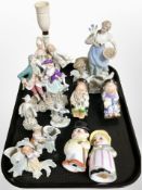 A tray of Capodimonte and other figurines, Bavarian porcelain lamp base, etc.