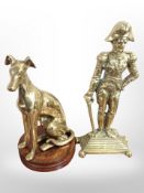 A brass figural doorstop, height 33cm, and a further figure of a seated greyhound on plinth.
