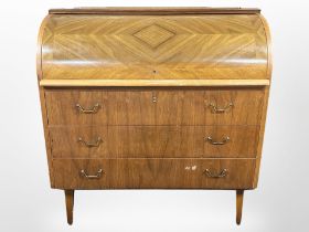 A 20th-century Danish teak cylinder-front bureau, 90cm x 47cm x 96cm.