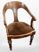 An early 20th-century Danish oak-framed armchair, width 57cm.