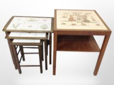 A 20th-century nest of three tables with tiled top,