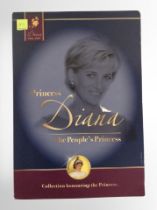 A set of seven gold-plated $1 coins commemorating Princess Diana, with certificate.