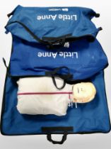 Two CPR dummies in carry bags.