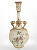 A Royal Worcester blush ivory twin-handled vase, shape number 1445,