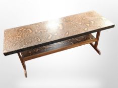 A 20th-century copper-topped rectangular coffee table, 121cm x 45cm x 43cm.