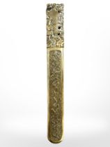 A Chinese bronze manuscript page turner, length 32cm.