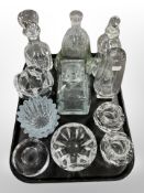 A tray of 20th-century glassware including tealight holders, decanters, vases, etc.