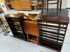 A pair of reproduction mahogany open book shelves, width 56cm, and a pair of teak folding tables.