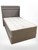 A 4' storage divan with upholstered headboard and Slumberland Vancouver mattress.