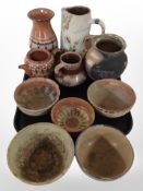 A group of antique glazed eartenware pottery vases, jugs and bowls.