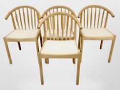 A set of four Danish beech spindleback elbow chairs.