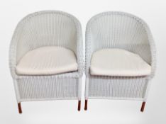 A pair of loom armchairs.