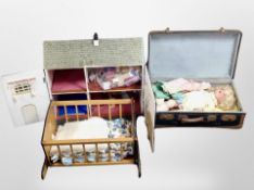 A doll's house, quantity of doll's house furniture, a doll's crib, vintage luggage case, etc.