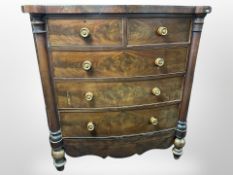 A Victorian mahogany bow-front chest of five drawers, 130cm x 58cm x 137cm.