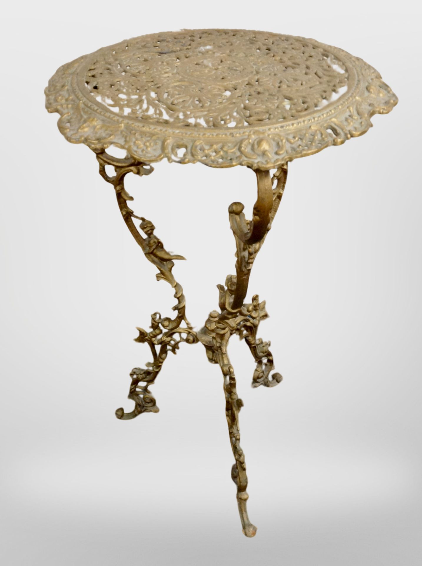 A 19th-century cast-metal jardiniere stand, 74cm high, 43cm diameter.