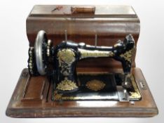 A Jones hand sewing machine.