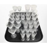 Approximately thirty one crystal drinking glasses