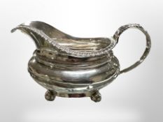 A George III silver cream jug, T Watson, Newcastle 1800. CONDITION REPORT: 149.