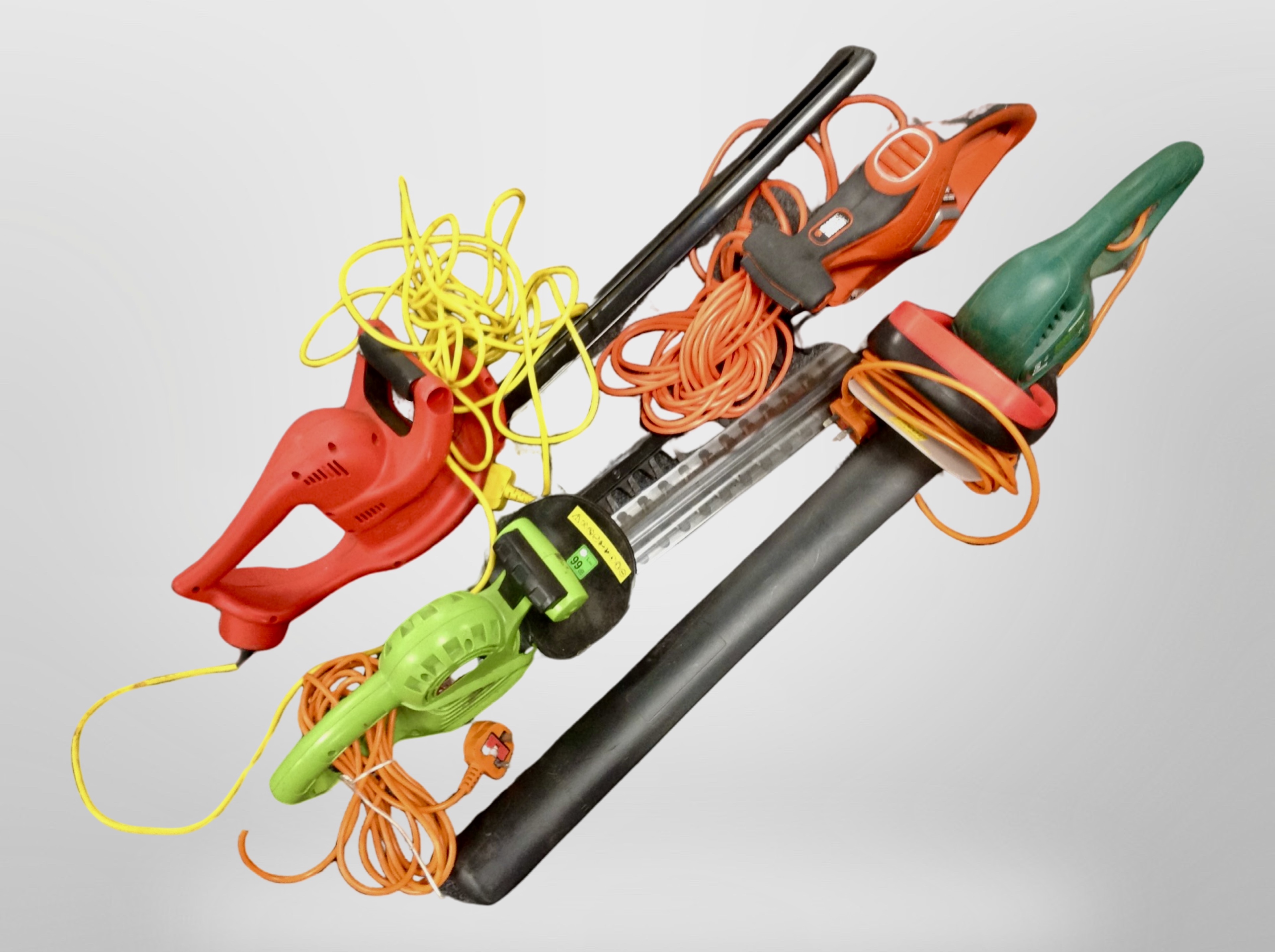 A group of electric hedge trimmers including Black and Decker.