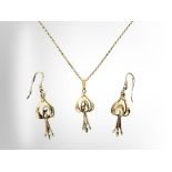 A suite of yellow gold jewellery comprising of pendant on chain and matching pair of earrings,