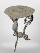 A 19th-century cast-metal jardiniere stand, 77cm high, 47cm diameter.