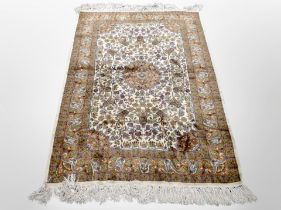 An Isfahan silk rug, Central Iran, 173cm x 102cm.