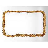 A Baltic amber beaded necklace, 25.1g.