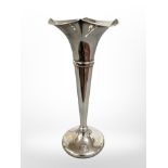 A tall silver spill vase, height 22.5 cm, Birmingham 1928. CONDITION REPORT: Loaded.