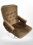 A 20th-century swivel armchair on chrome support upholstered in striped brown fabric.