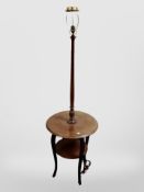 A 20th-century Danish mahogany standard lamp occasional table, diameter 54cm.